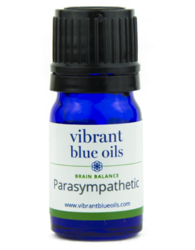 A small blue glass bottle with a black cap, labeled "vibrant blue oils | Brain Balance | Parasympathetic" and a website URL "www.vibrantblueoils.com" at the bottom. The label features a simple design with blue and green text on a white background.